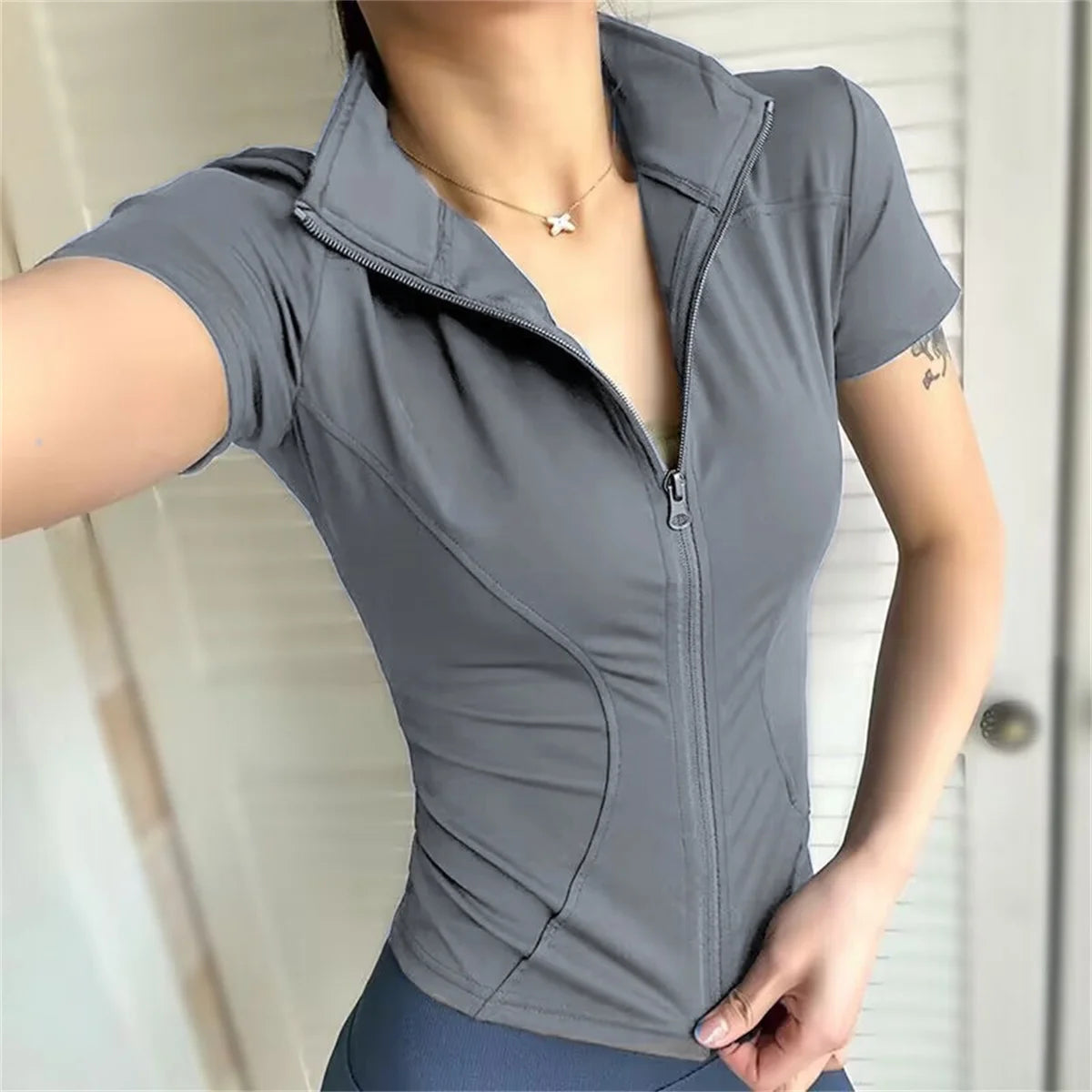 Short-Sleeve Zip Top — Women's Breathable Layer for Rides & Runs